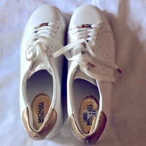 Never worn MK Sneaker must have for all weather .